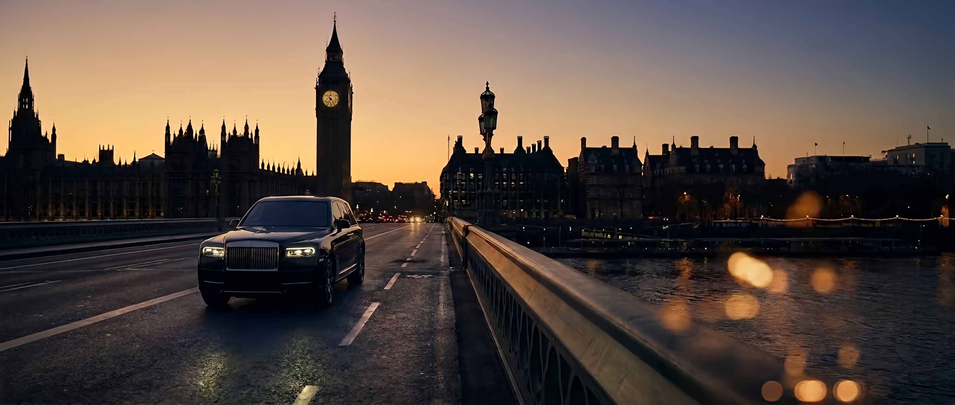 A Simplaa flagship vehicle crossing Westminster Bridge at dusk